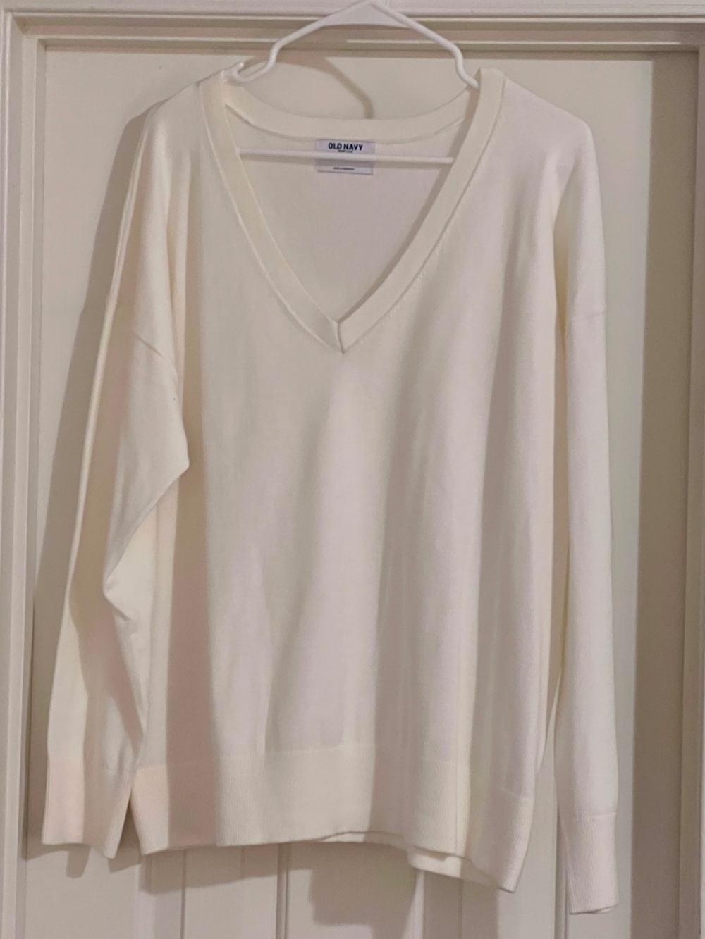 Cream V-neck sweater
